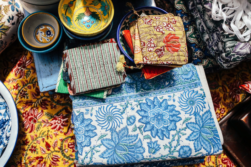 Block-printed table linen and painted bowls.