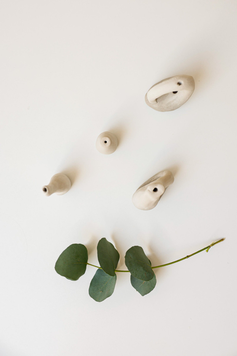 A platter of clay trinkets from above.