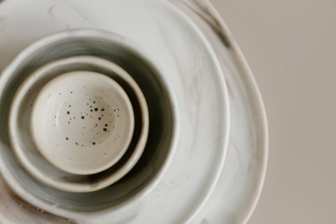 Speckled nesting bowls, stacked.