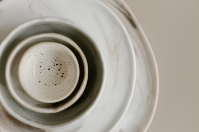 Speckled nesting bowls, stacked.